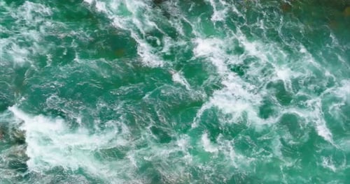 Top Down View of Fast Moving River with Rapids