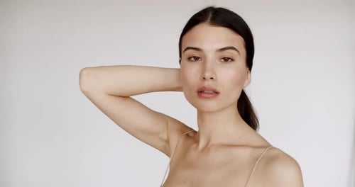 Woman Posing with Hair Up Indoors