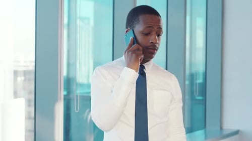 African businessman, phone call and walking in office for online conversation