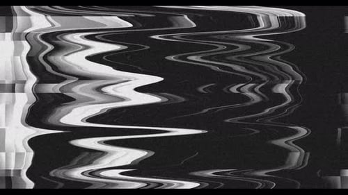 Glamour Collection: Tiny particles emanating diagonally out from copy space in center towards top ri