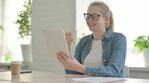Woman Chatting on Tablet Video Conference