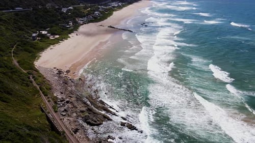 Beautiful aerial view over vast white sand beach in Wilderness, Garden Route