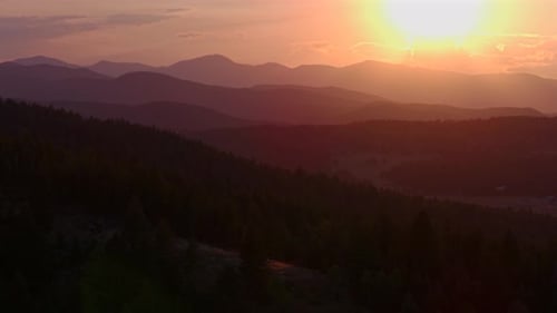 Golden hour sunset Mt Mount Blue Sky Evans Front Range Rocky Mountains Evergreen Conifer aerial dron