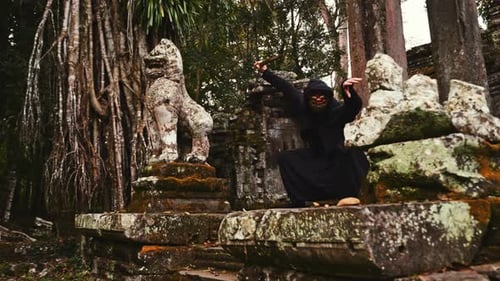 Masked Figure Practicing Swordplay at Temple Ruins