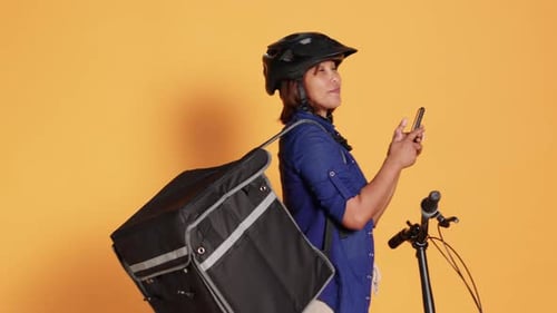 Delivery Person with Bicycle and Smartphone