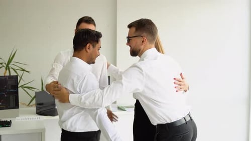 Team Celebrates Success in Modern Workplace