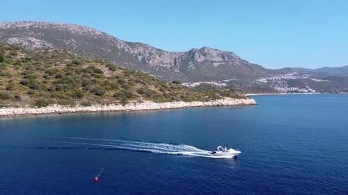 Tracking shot of a boat.