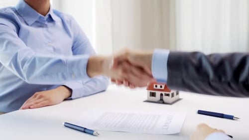 Real Estate Deal and Handshake