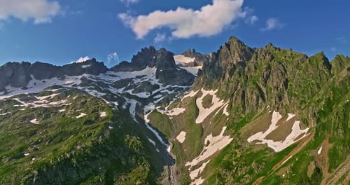 Ancient Snow Glacier Among High Mountains The Peaks of the Mountains are Covered with Snow