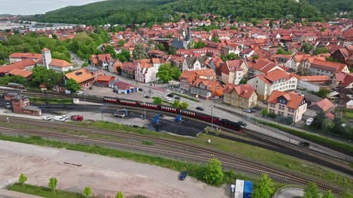 Aerial view of old steam train running on the track in Wernigerode