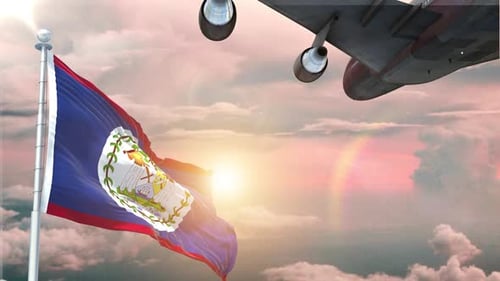 Belize Flag Waving with Airplane Flying at Sunset