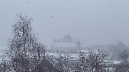 Heavy Snowfall Blanketing the Charming Old Town Vilnius, Lithuania; Baroque and Gothic Architecture