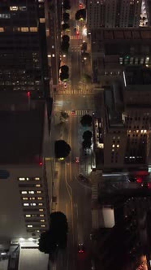 Downtown Los Angeles Top Down Nighttime Aerial of Moving Traffic on Busy Urban Street with