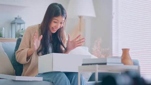 Woman Delighted by a Delivery in Living Room