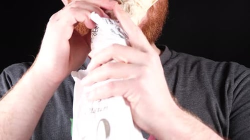 Man Eating Burrito