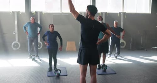 Stretching, gym and personal trainer with senior people for training, exercise