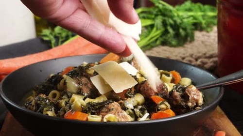 Adding Cheese Shards to Hearty Italian Soup