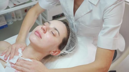 Woman Receiving Facial Treatment at Medical Spa