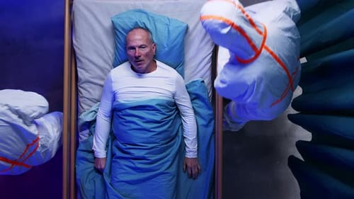 Covid Patient Care in Hospital Room