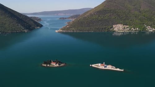 Our Lady of the Rocks and Gospa od Skrpjela islets against mountains,Bay of Kotor, Montenegro