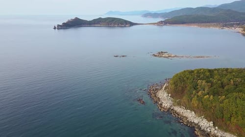 Explore the Breathtaking Beauty of a Small Island Surrounded By the Vast Ocean with Stunning Aerial