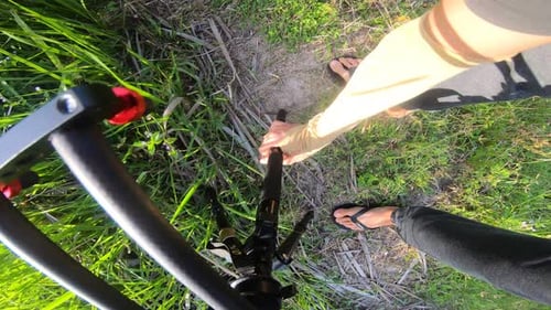 Assembling Camera Slider on Lush Tropical Lawn