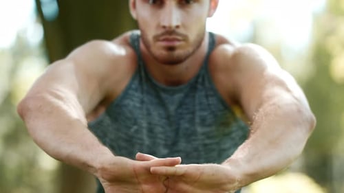 Sporty Man Stretching Hands Before Fitness Training Outdoor. Close Up of Male