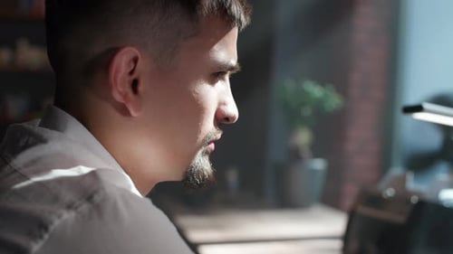Cryptocurrency Trading Young Man Trader Working with Financial Exchanges in a Modern Country Office