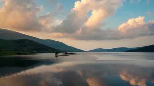 Sunset view of а mountain lake and beautiful reflections