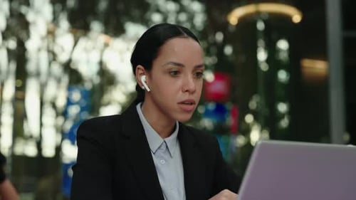 Annoyed Business Lady in Formal Suit Talking in Computer Videocall Office