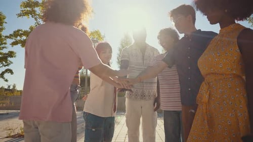 Diverse Young Adults Celebrating Together in Sunny City