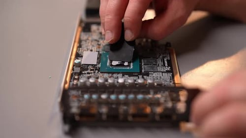 Applying Thermal Paste to Computer CPU