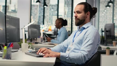 Day Trader Analyzes Stock Market Trends and Price Candlestick Charts in Office