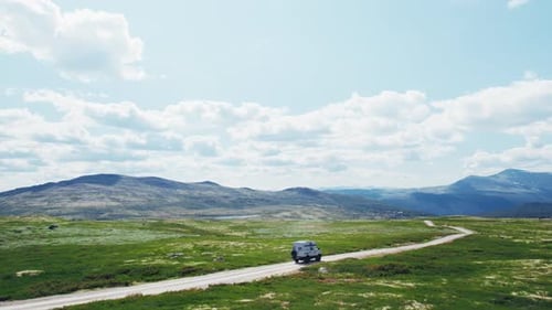 Aerial of Camper Van Drive Off Road on Mountain