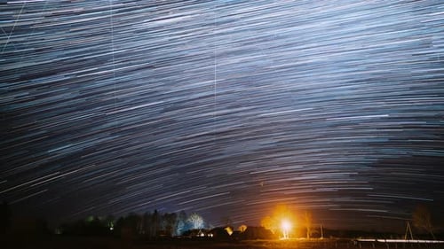 Amazing Unusual Stars Effects Bright Blue Colors Timelapse Night Starry Sky Above Village Sky