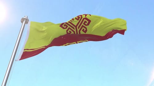 Realistic Waving Flag with Abstract Emblem Against Blue Sky