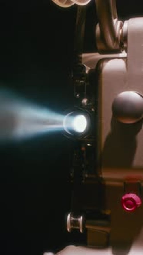 Vintage Film Projector in Dark Room