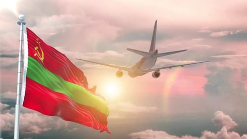 Waving Flag And Airplane Flying In A Sunset Sky