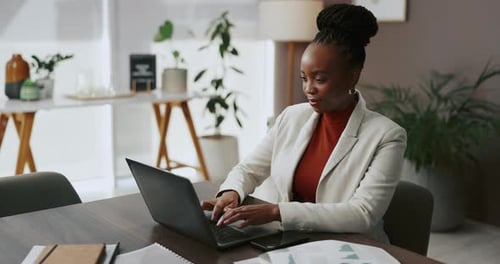 Accountant, office and business black woman on laptop for finance report, research and analytics