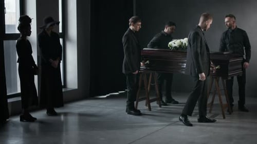 Solemn Funeral Scene with Casket and Mourners