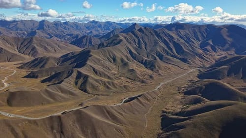 Breathtaking Aerial View of Rugged Lindis Pass Mountains in New Zealand