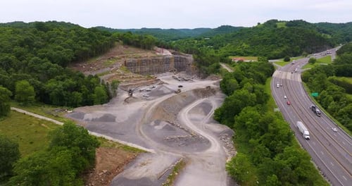 Industrial Openpit Mining Site with Limestone Quarry at Mountain Hillside