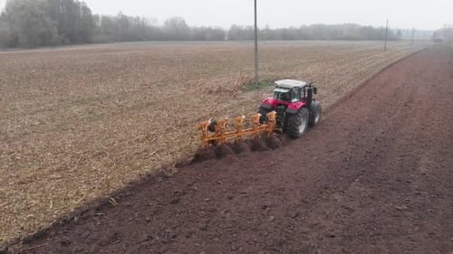 Tractor plowing the field in Ukraine