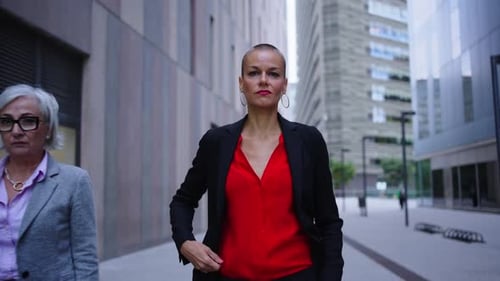 Empowered Women Walking Confidently in an Urban Center