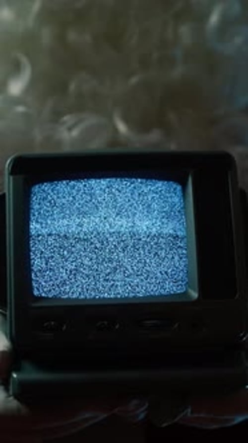 Santa Claus Holds Static Television Signal In Front Of Christmas Tree