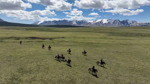 Aerial view of Altai Mountains and riders, Mongolia.