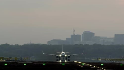 Passenger Airplane Taking Off From Runway