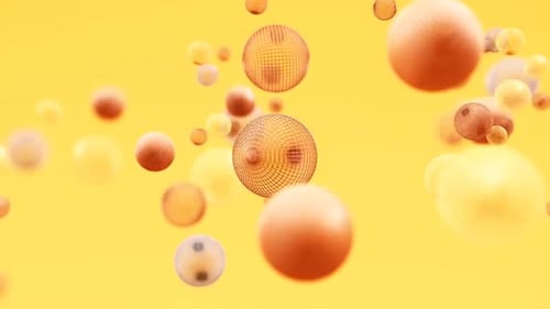 Floating Spheres on Yellow Background
