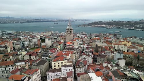 Circling drone around the Galata Tower in Istanbul, Bosphorus and Golden Horn