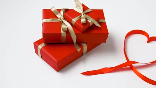 Red Wrapped Gifts and Heart Shaped Ribbon